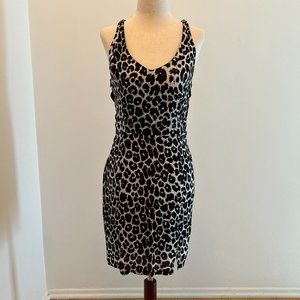 MYNE Ashely Ann Snow Leopard V Neck dress with open back